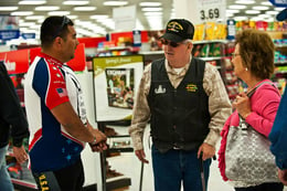 two veterans communicating while shopping in a store